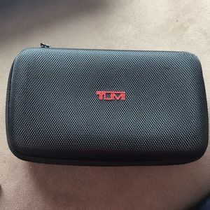 Hard sided Tumi travel case